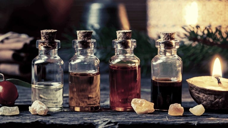 4 masculine oils on altar