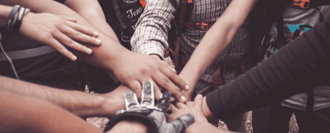 hands team gathering aid