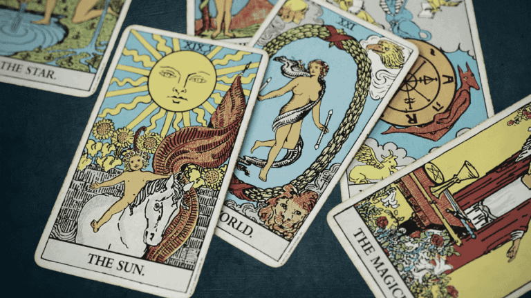 Tarot Cards on Table Masculine and Feminine figures