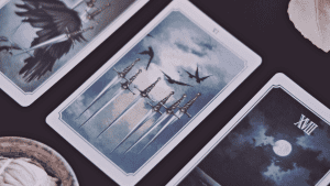tarot cards shadow work swords and crows